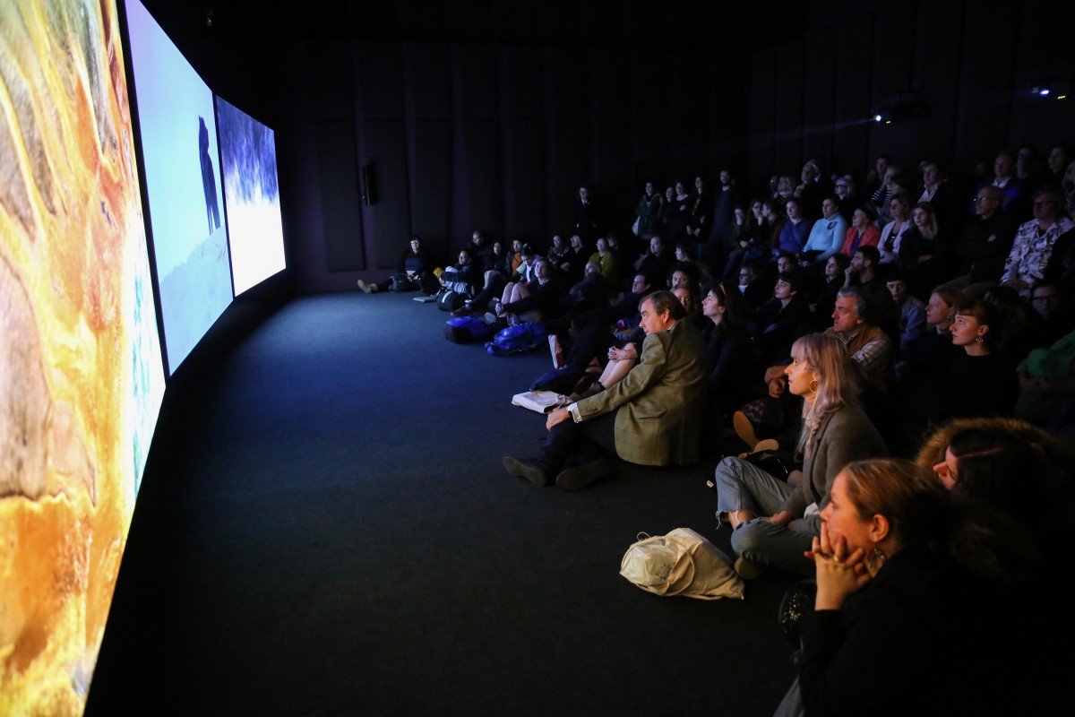 John Akomfrah, 'Vertigo Sea', 2015. Audience in front of a video still, installation view, 2017. Image courtesy The Talbot Rice Gallery, The University of Edinburgh.