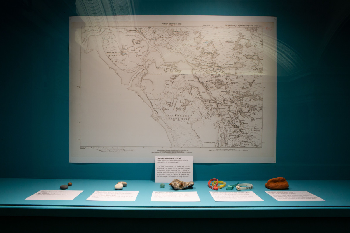 a map of Scotland and a series of small objects 
