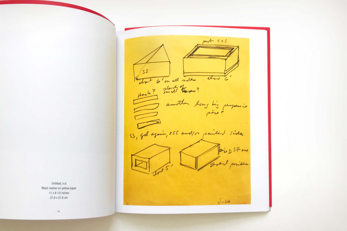 Inside look of page spread with drawing on yellow paper and title