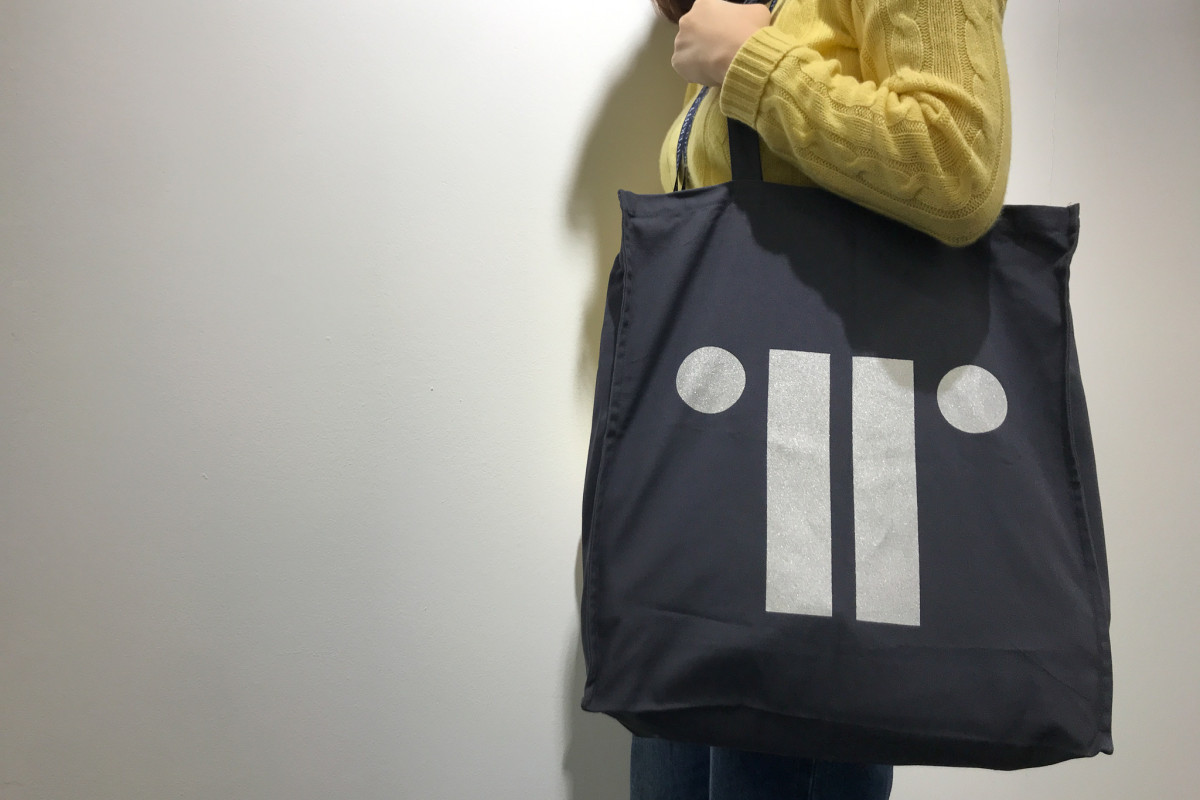 Closeup of person holding bag