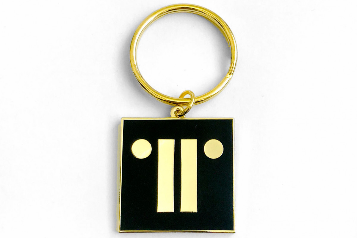 Gold and black key ring with Talbot Rice Gallery logo