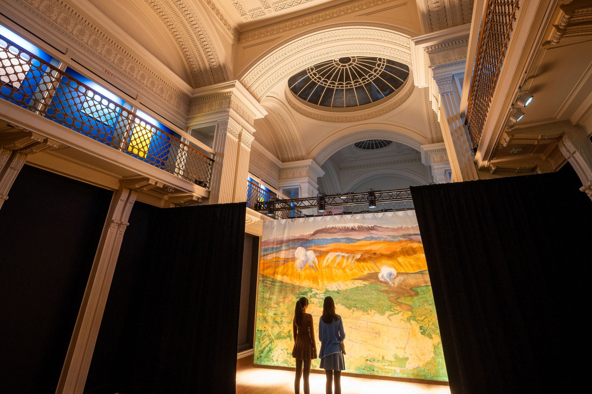 Two people standing in Talbot Rice Gallery's Georgian Gallery