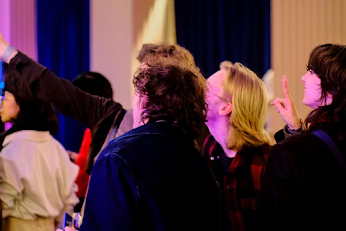 A group of students in the Playfair Library at Talbot Rice Gallery
